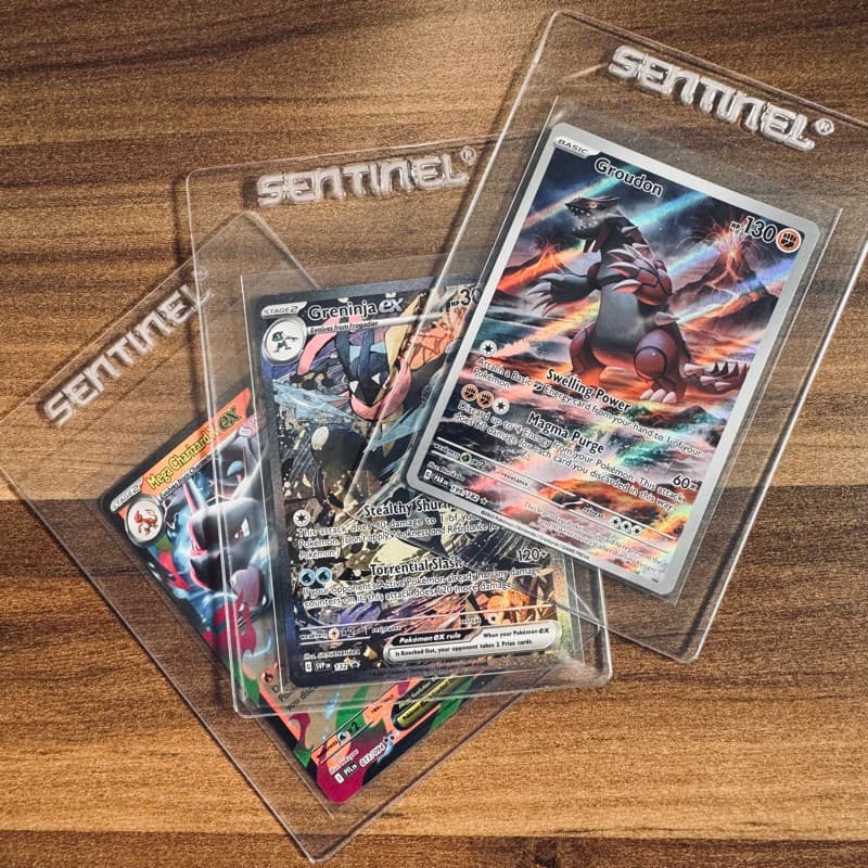 Pokémon TCG cards in protective cases